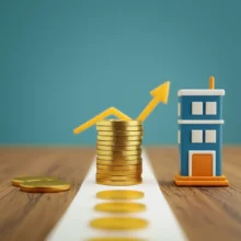 성장과-성공을-상징하는-작은-동전-더미에서-사업-건물로-향하는-3D-이미지