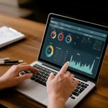 Hands-managing-donation-data-on-a-screen-for-a-non-profit