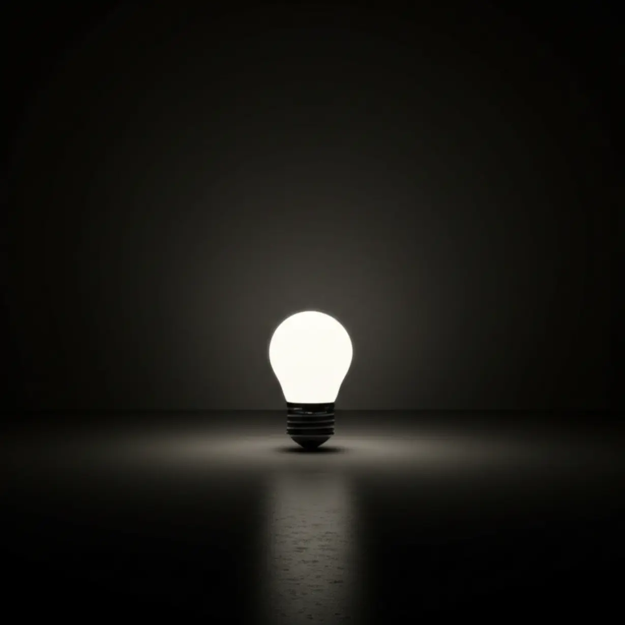 어두운-공간에-작은-빛을-내는-전구-이미지.-배우-한소영의-무명-시절-어려움을-상징합니다.