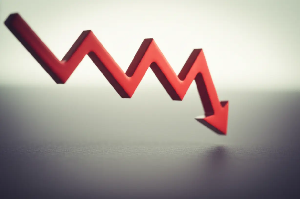 급격히-하락하는-주식-시장-그래프.-대주주-세금-강화로-인한-투자-심리-위축과-주가-하락을-나타내는-이미지.